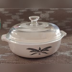 Vintage Anchor Hocking Black Wheat 7" baking dish with clear glass lid.